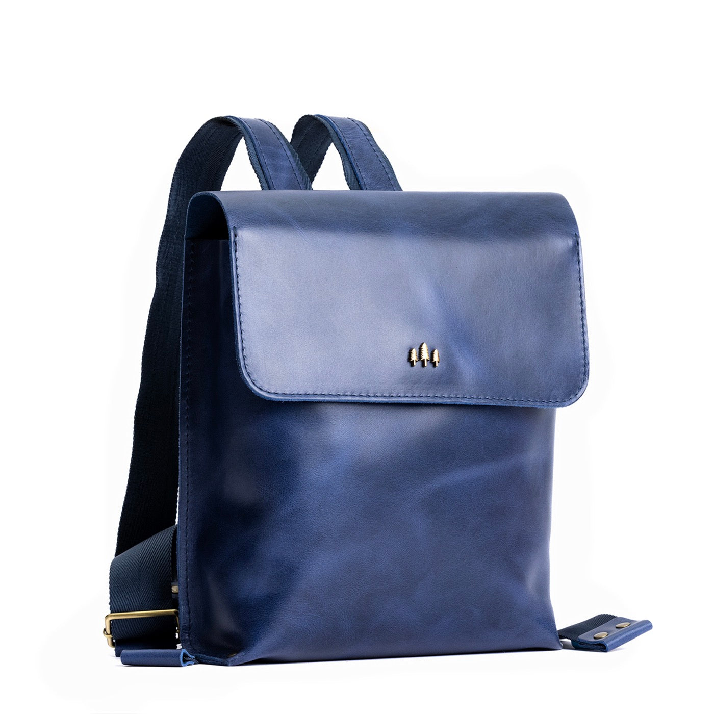 Cowboy Blue | Rectangular backpack with leather lined nylon straps and magnetic flap closure