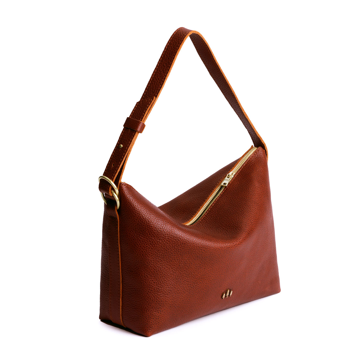 Nutmeg Large | Medium sized slouchy leather shoulder bag with zipper opening and three metal tree emblems