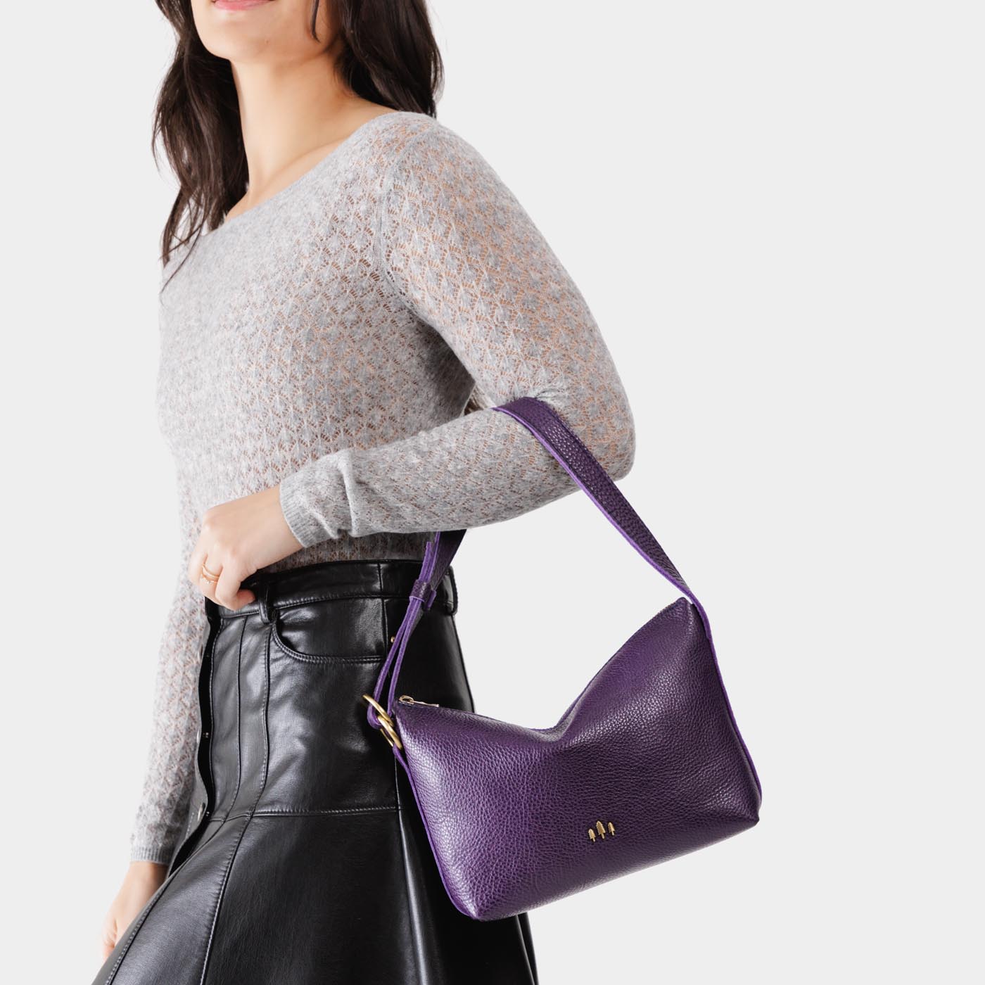 Empire Small | Petite slouchy leather shoulder bag with zipper opening and three metal tree emblems