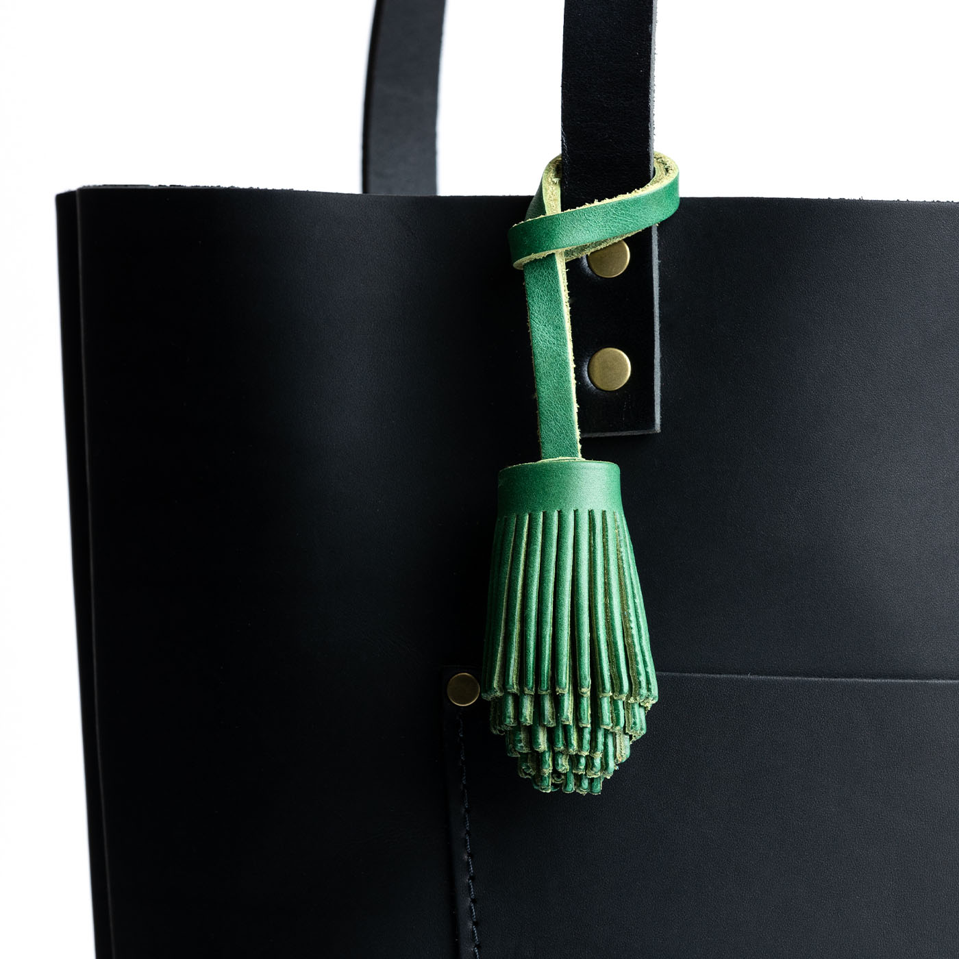 All Color: Cowboy Mint | Pom-pom style with tiered leather fringe