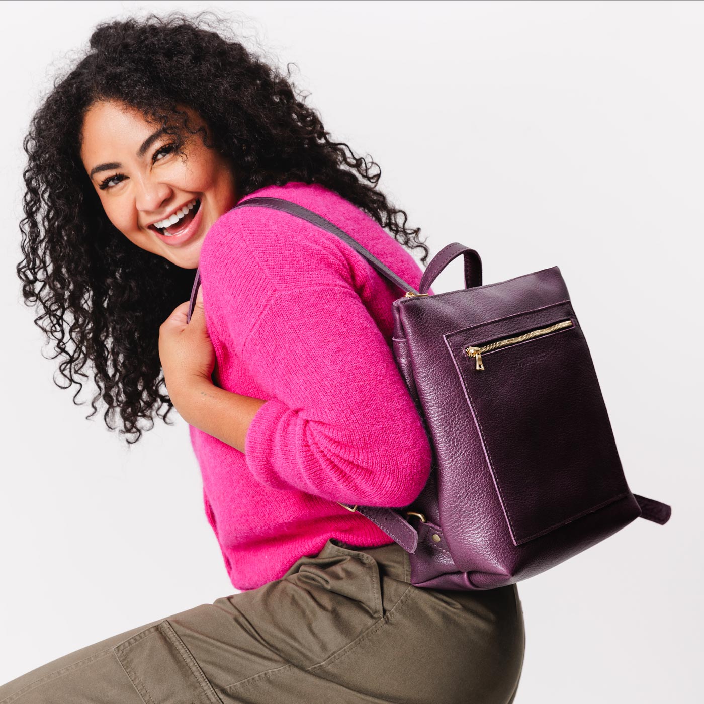 All Color: Plum | Model wearing square slim leather tote backpack