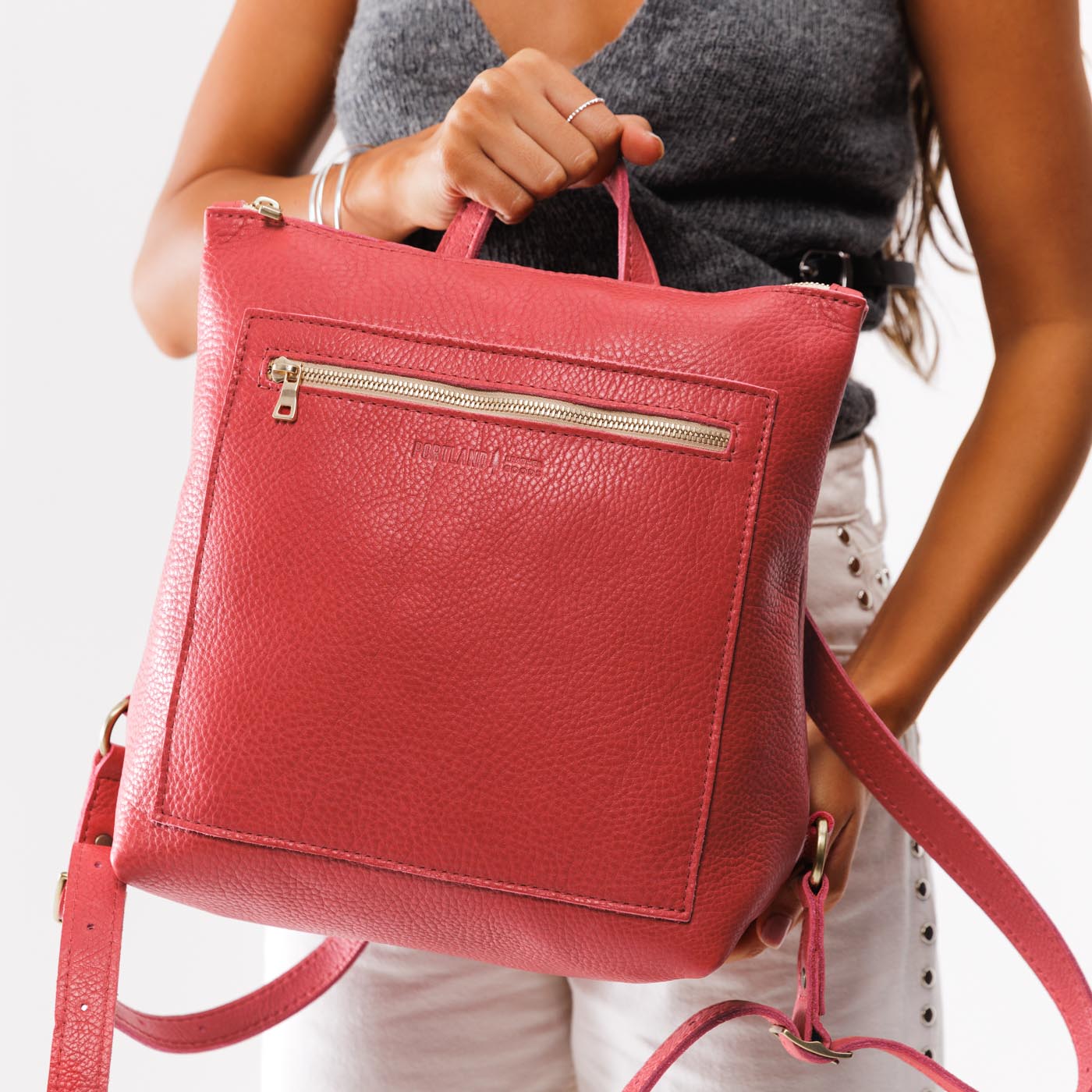 Sugar | Model holding square slim leather tote backpack