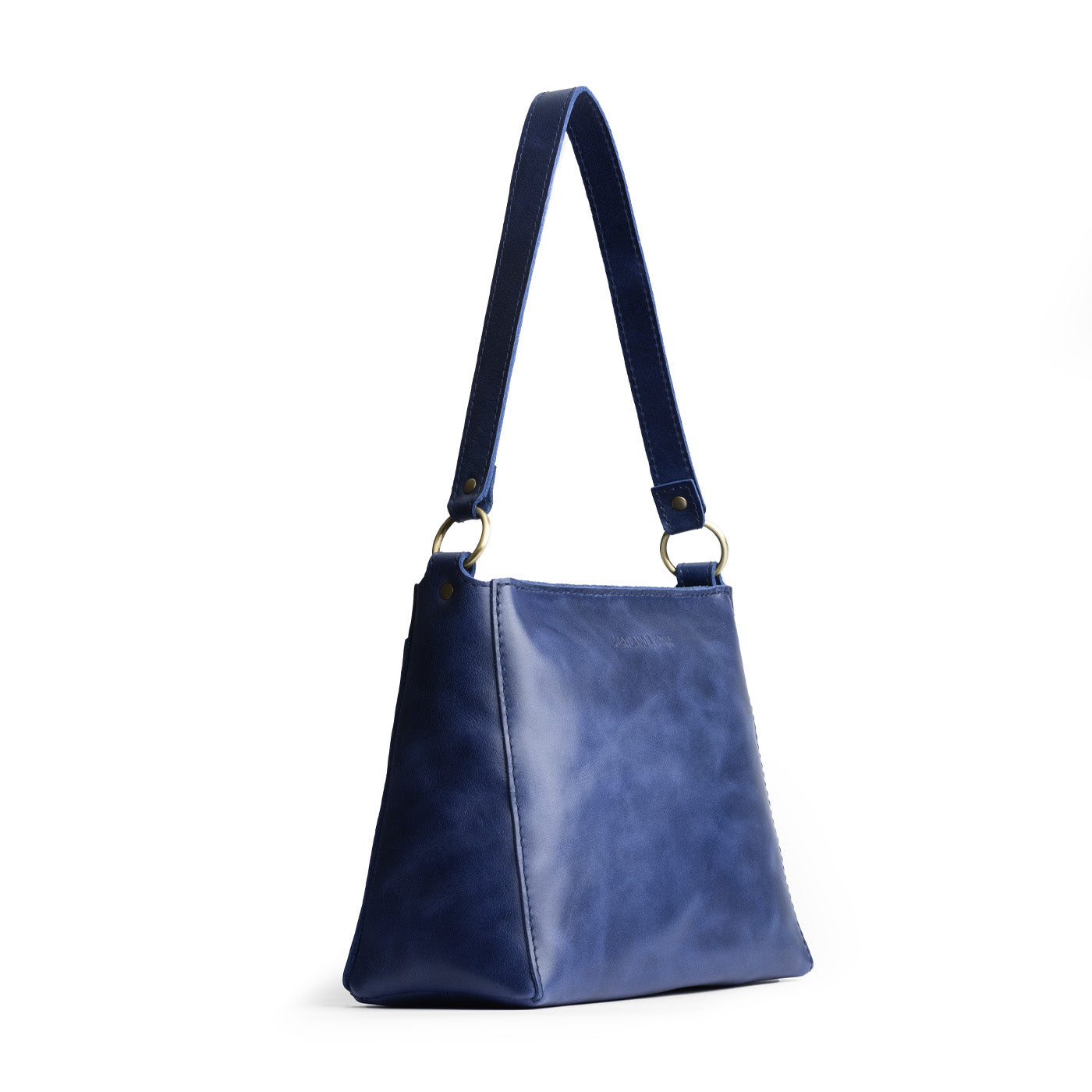 Cowboy Blue | Triangular shoulder bag with antiqued brass finished hardware