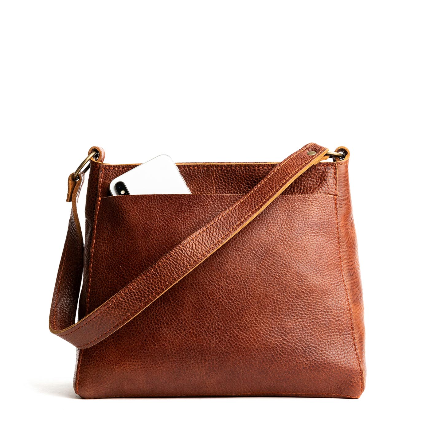 Nutmeg | Triangular shoulder bag with antiqued brass finished hardware