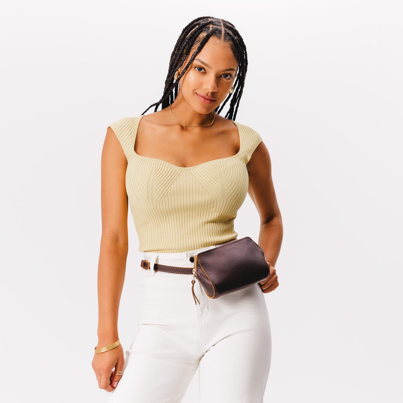 Grizzly  | Model wearing petite bag with top zipper closure and adjustable belt strap on the waist