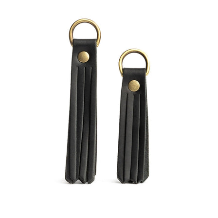 All Color: Black | slim leather tassel with brass ring