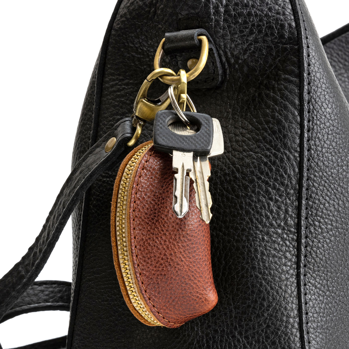 All Color: Nutmeg | Small taco shaped pouch, swivel lobster clasp